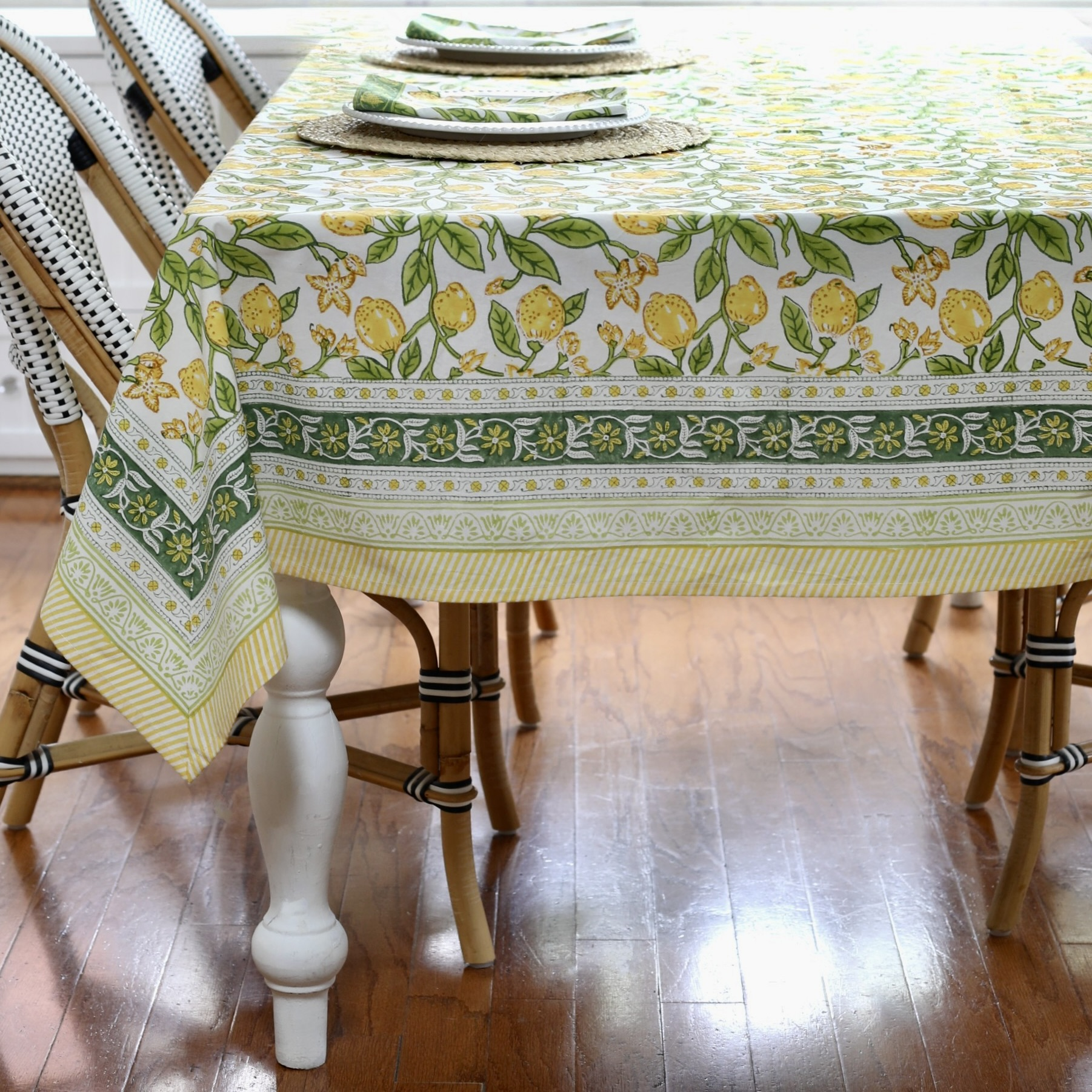 Tablecloth in olive green with teal motifs